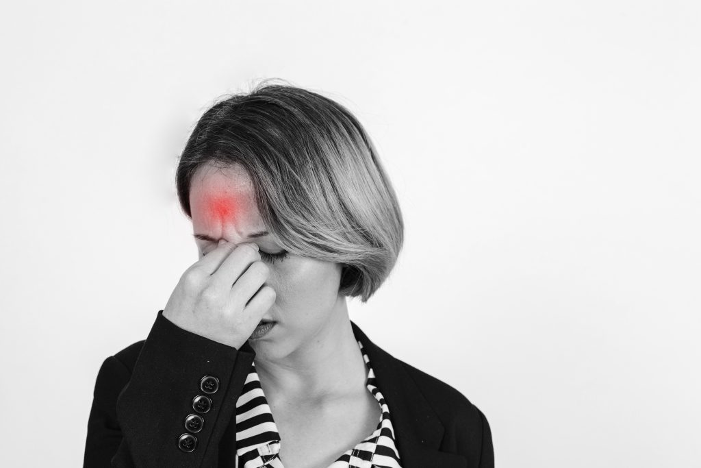 woman with headache studio KPM Physiotherapy